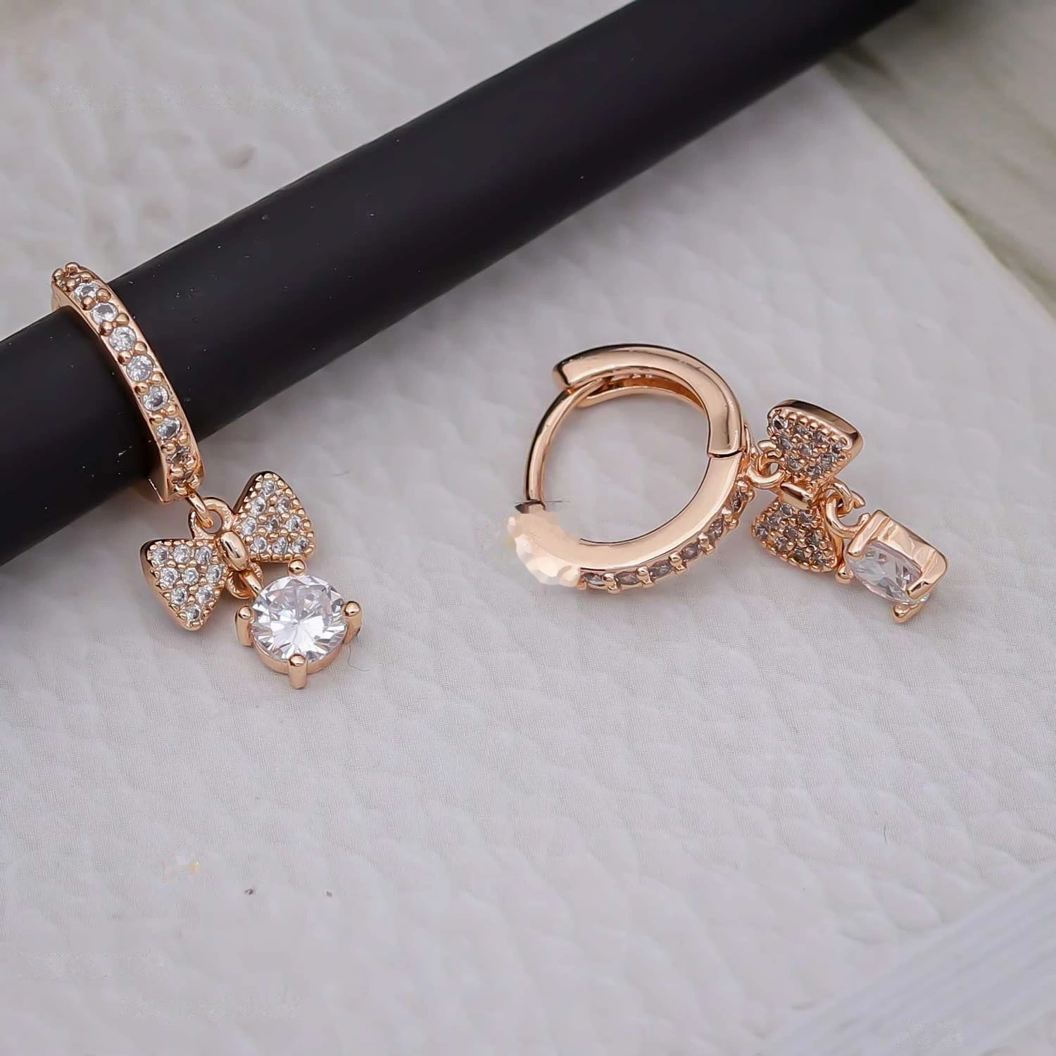 Rose Gold Bow Solitaire Drop Huggie Hoops