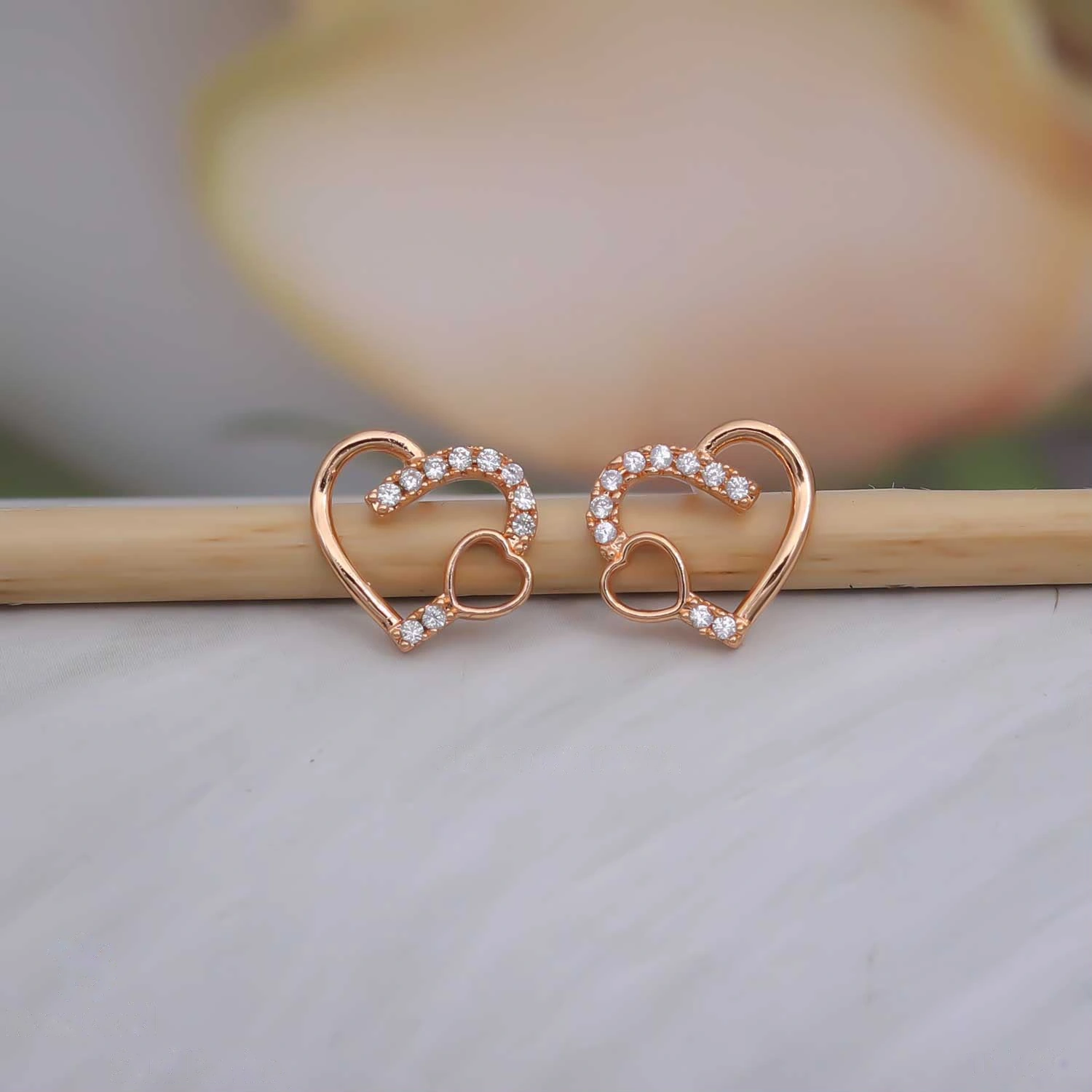 Rose gold double heart crystal stud earrings