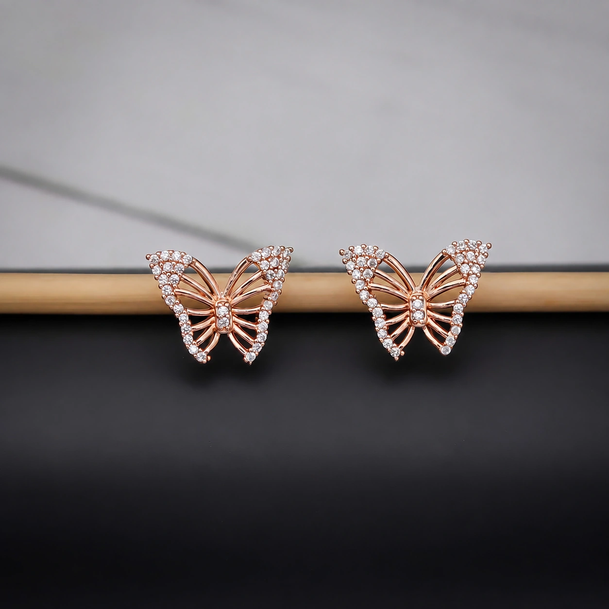 Rose gold openwork butterfly crystal stud earrings